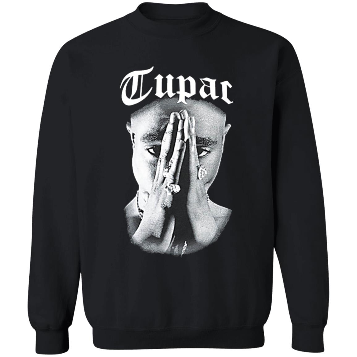 Tupac Shirt. Celebrate one of hip-hop's greatest legends with the Cross Colours x Tupac Praying Hand black t-shirt. Featuring a praying-hands picture of Tupac Shakur with large