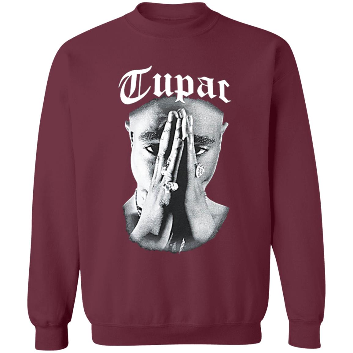 Tupac Shirt. Celebrate one of hip-hop's greatest legends with the Cross Colours x Tupac Praying Hand black t-shirt. Featuring a praying-hands picture of Tupac Shakur with large